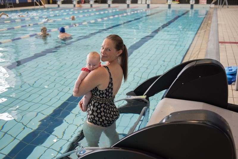 Mum and baby using pool pod