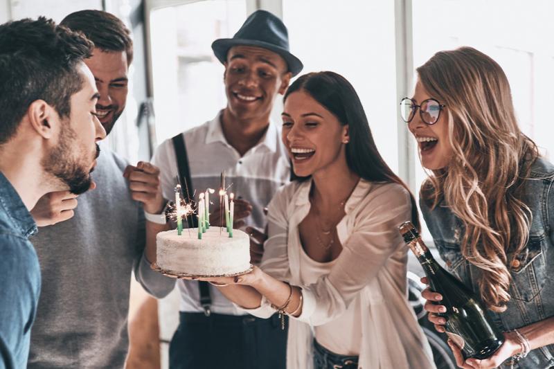 People enjoying a birthday party