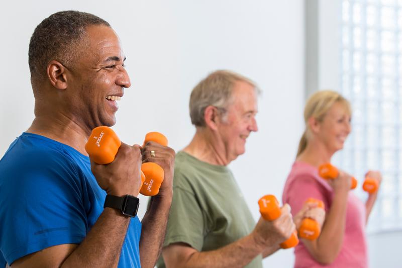 People exercising while smiling