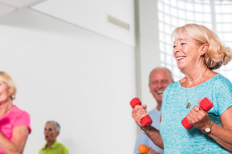 Primetime exercise class, with people smiling