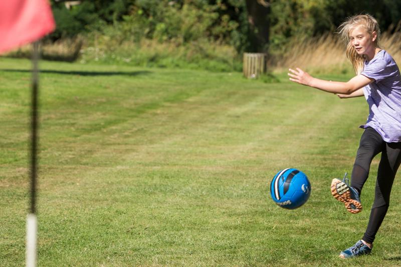 Girl playing FootGolf