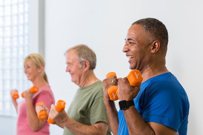 People enjoying exercise in a relaxing studio