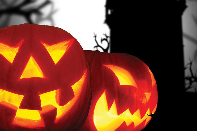Halloween pumpkin lanterns and a spooky sky
