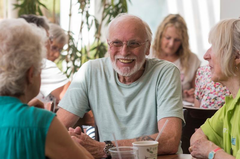 Primetime members chatting in the cafe