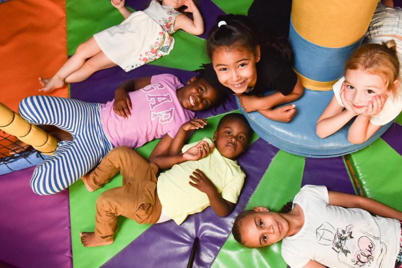 Children in the Buzz Zone Soft Play lying down