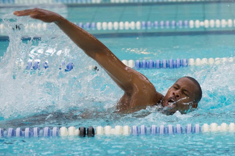 Man swimming front crawl