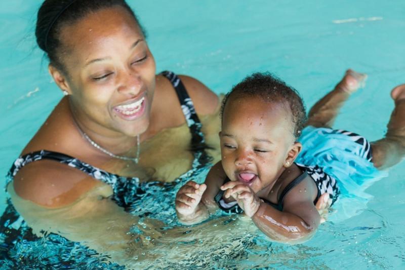 This Girl Can Swim image of mother and baby swimming