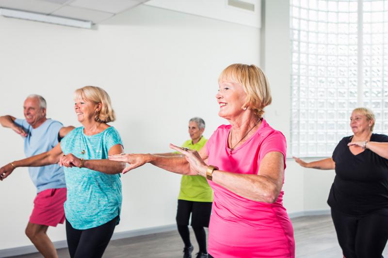 Primetime class where people are enjoying moving through dance