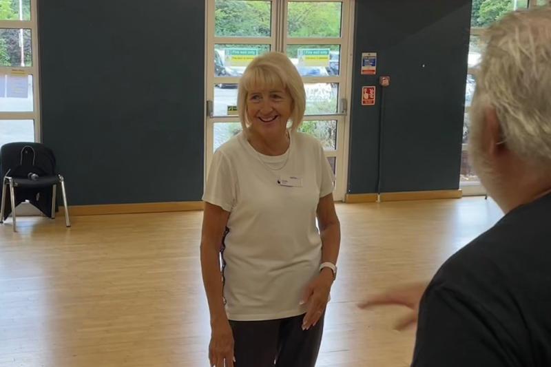 Community Health Pioneer Annie speaking with members at a Mytime Active centre